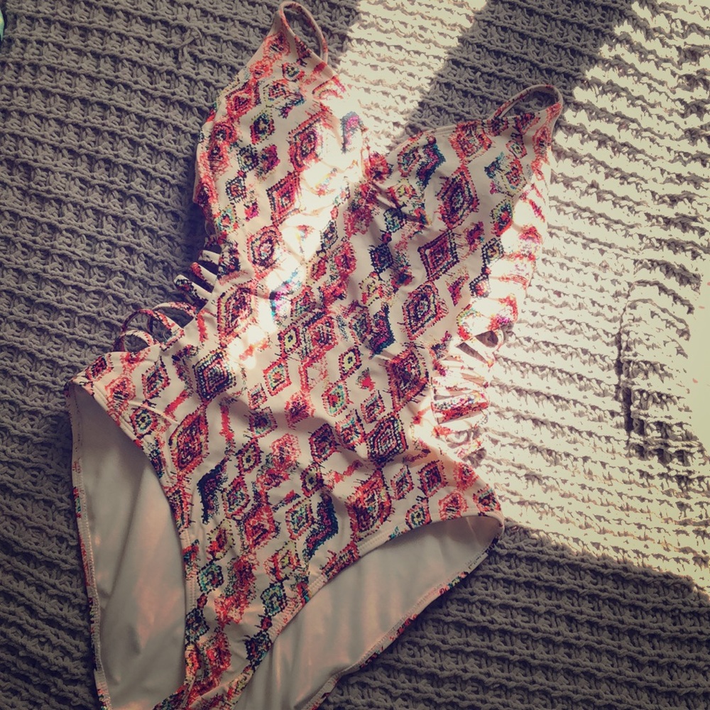 One piece swimsuit.